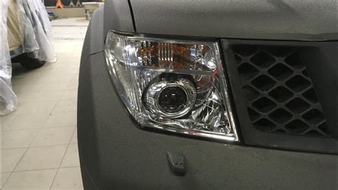 Как найти местонахождение предохранителя ближних фар на автомобиле Nissan Pathfinder R51