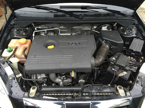 Поиск маркировки двигателя на поверхности автомобиля Чери Фора